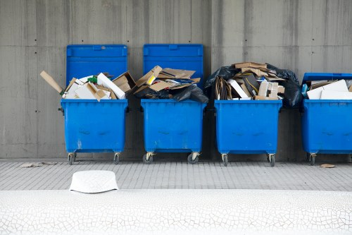 Customer pointing at a skip service vehicle