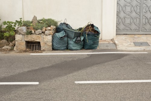 Workers loading up a van for rubbish collection in Docklands