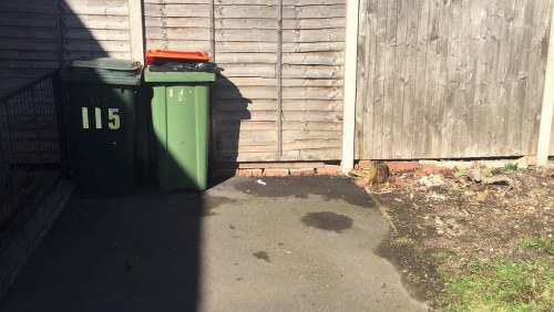 Man and van parked outside a terraced house ready to load rubbish